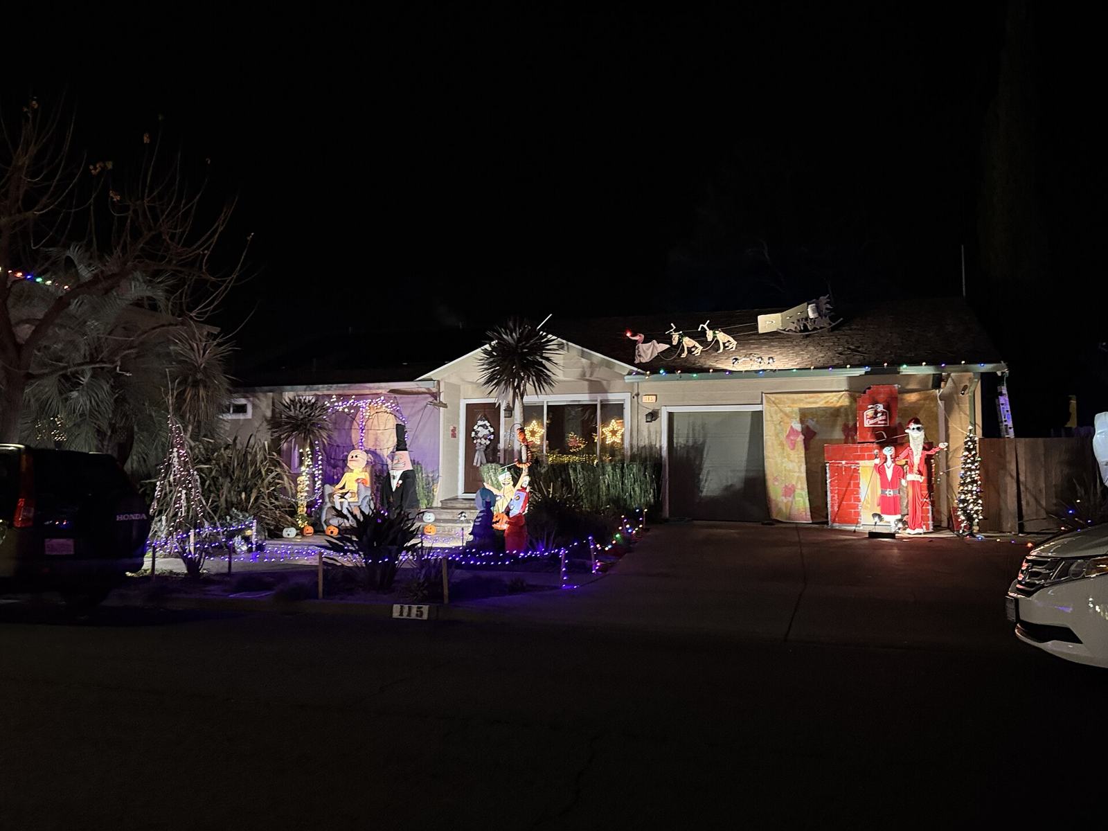 Warm-white holiday lights on a brick Georgian house
