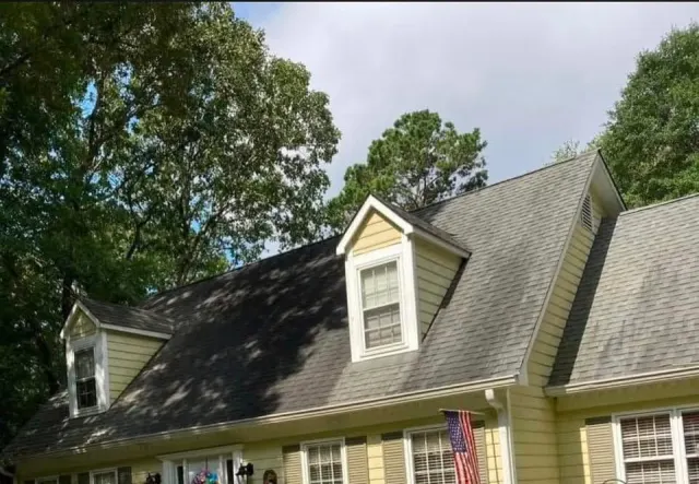 Photo 1 from the job: Roof soft washed 3 years ago, still clean